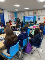 Teacher teaching Chess 